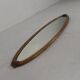 Oval gold mirror with faceted edge, 1950s