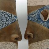 Pair of ceramic face vases