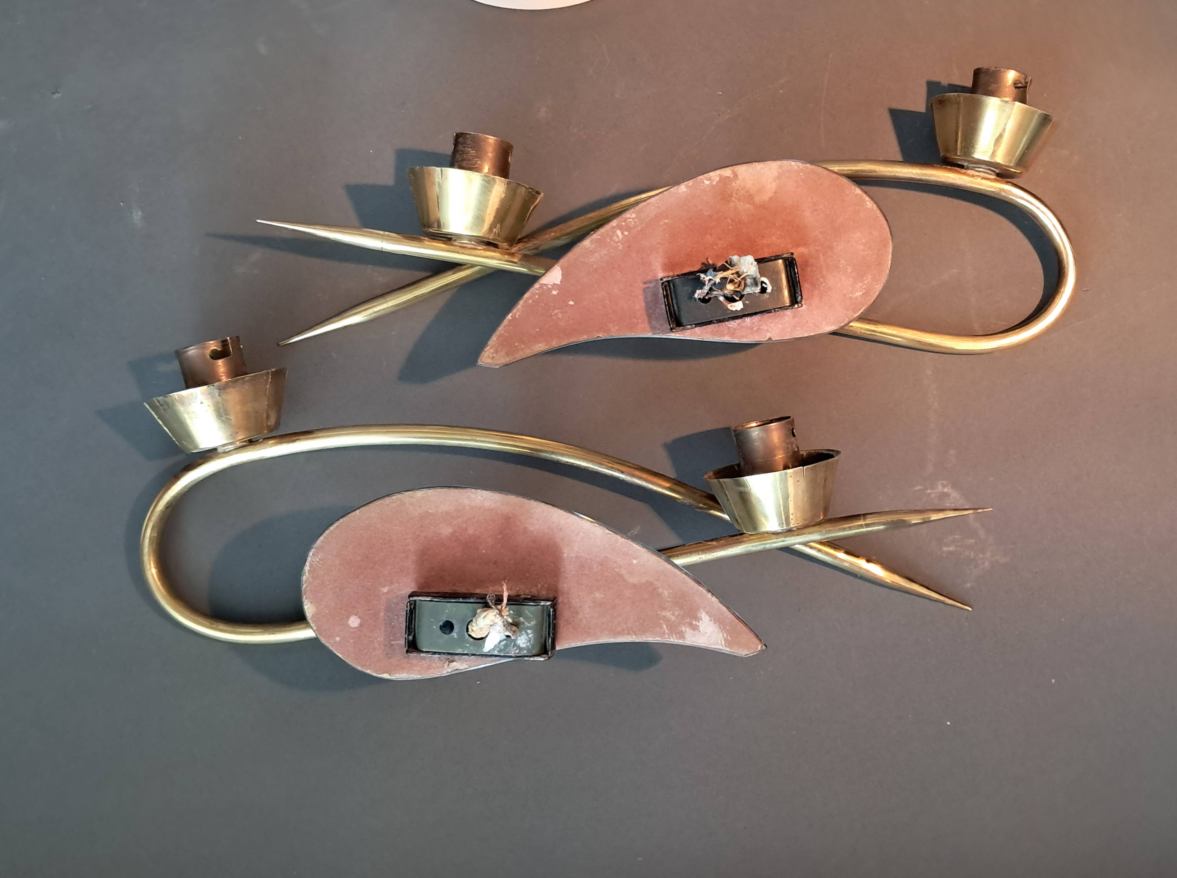 Pair of gilded brass and mirror wall lights, Circa 1960.