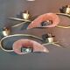 Pair of gilded brass and mirror wall lights, Circa 1960.