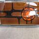 Metal and ceramic earthenware coffee table