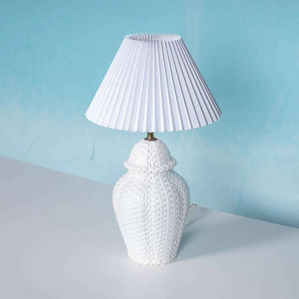 Vintage table lamp in woven ceramic Regency style.