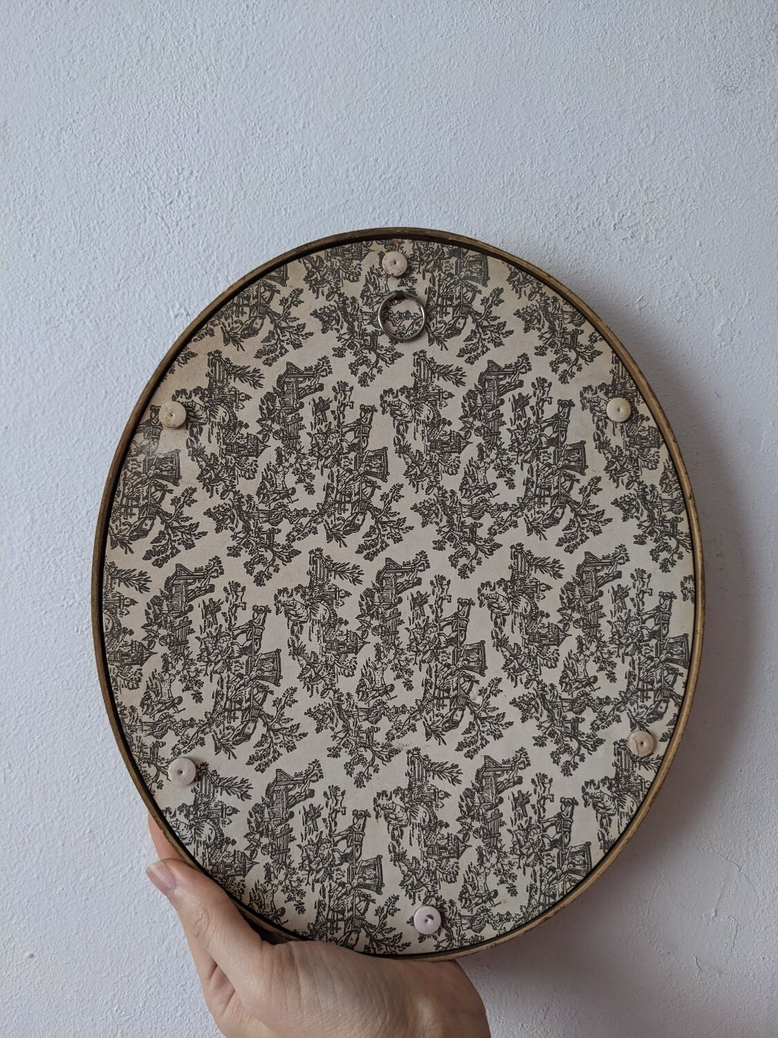 Golden vintage frame with bouquet of dried flowers under globe, wedding bouquet, antique bouquet