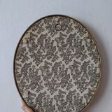 Golden vintage frame with bouquet of dried flowers under globe, wedding bouquet, antique bouquet