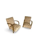 Ensemble de fauteuils Art Déco avec accoudoirs en hêtre arqués.