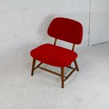 Chauffeuse by Alf Svensson, Model TeVe, published by Ljungs Industrier, Sweden, 1953. Retyped red.