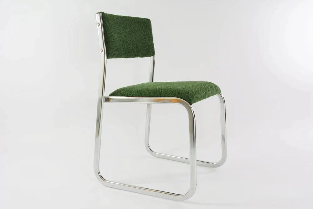 Chrome metal sled chair with green fabric