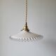 Serrated opaline suspension