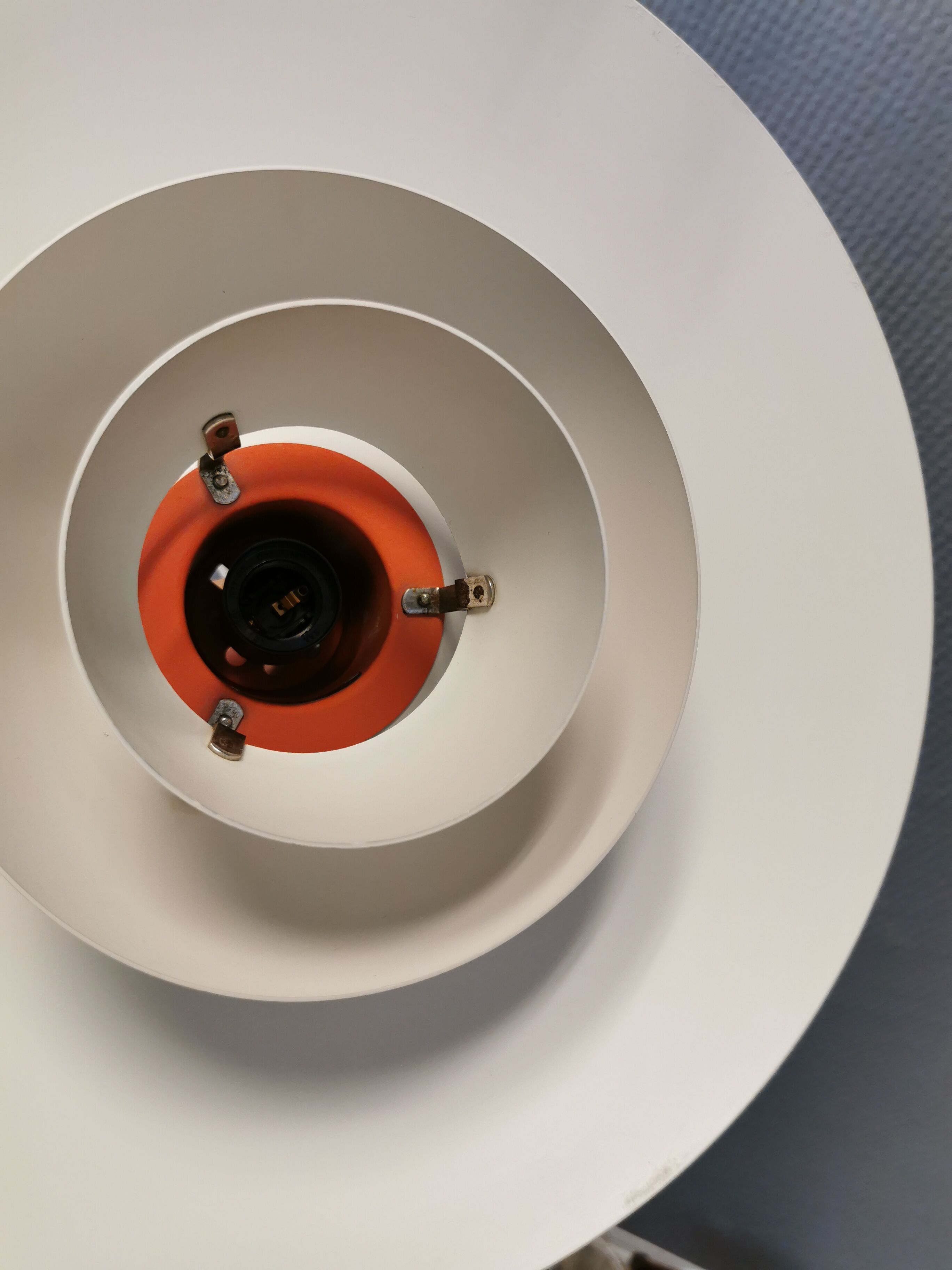 Older ph 4/3 hanging lamp, in white, with original orange suspension disk.
