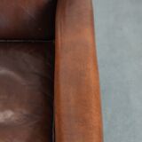 Armchair made of sheepskin leather in art deco design with warm colours