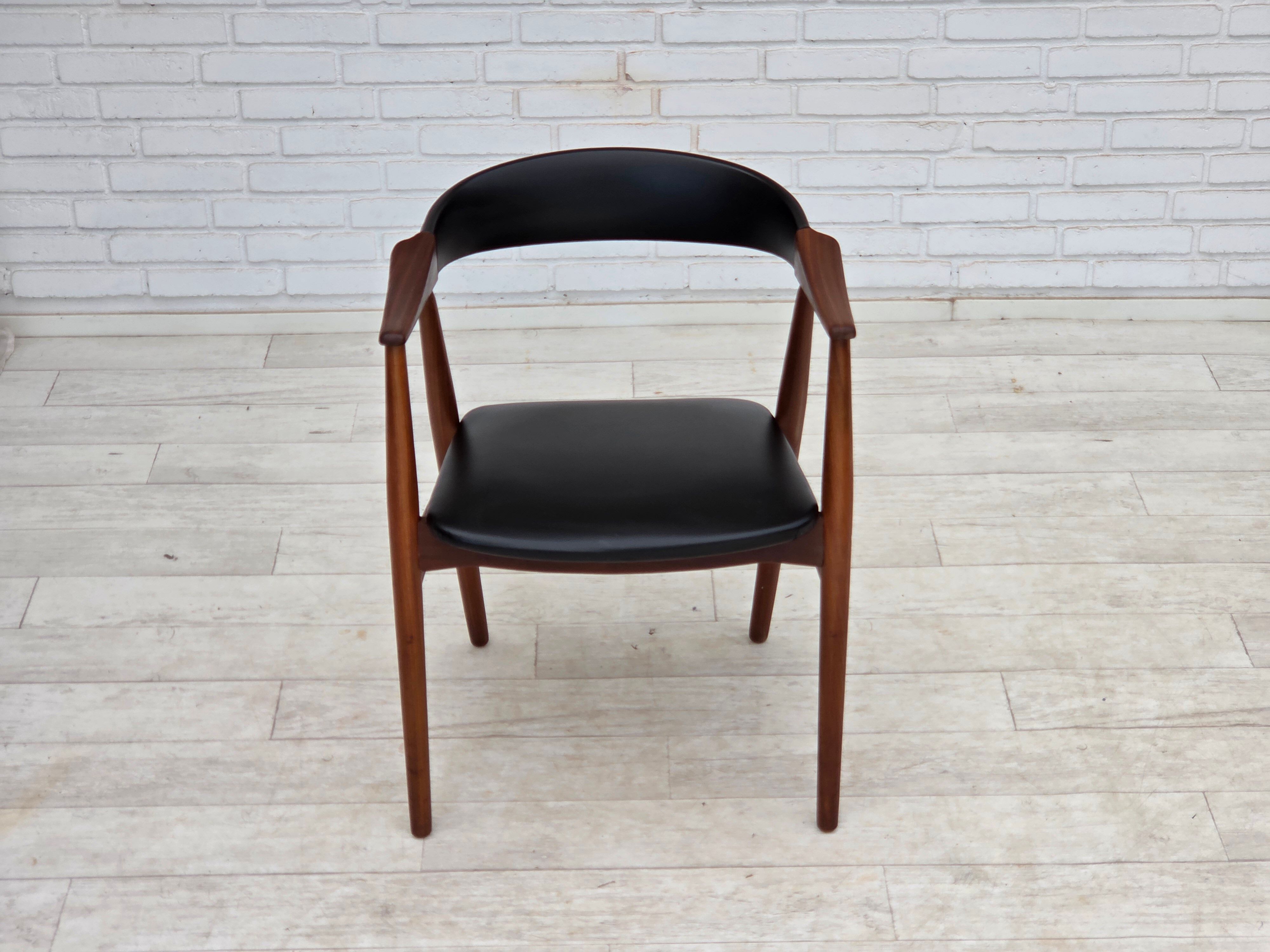 1960s, Danish armchair. Teak wood, black artificial leather.