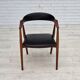 1960s, Danish armchair. Teak wood, black artificial leather.