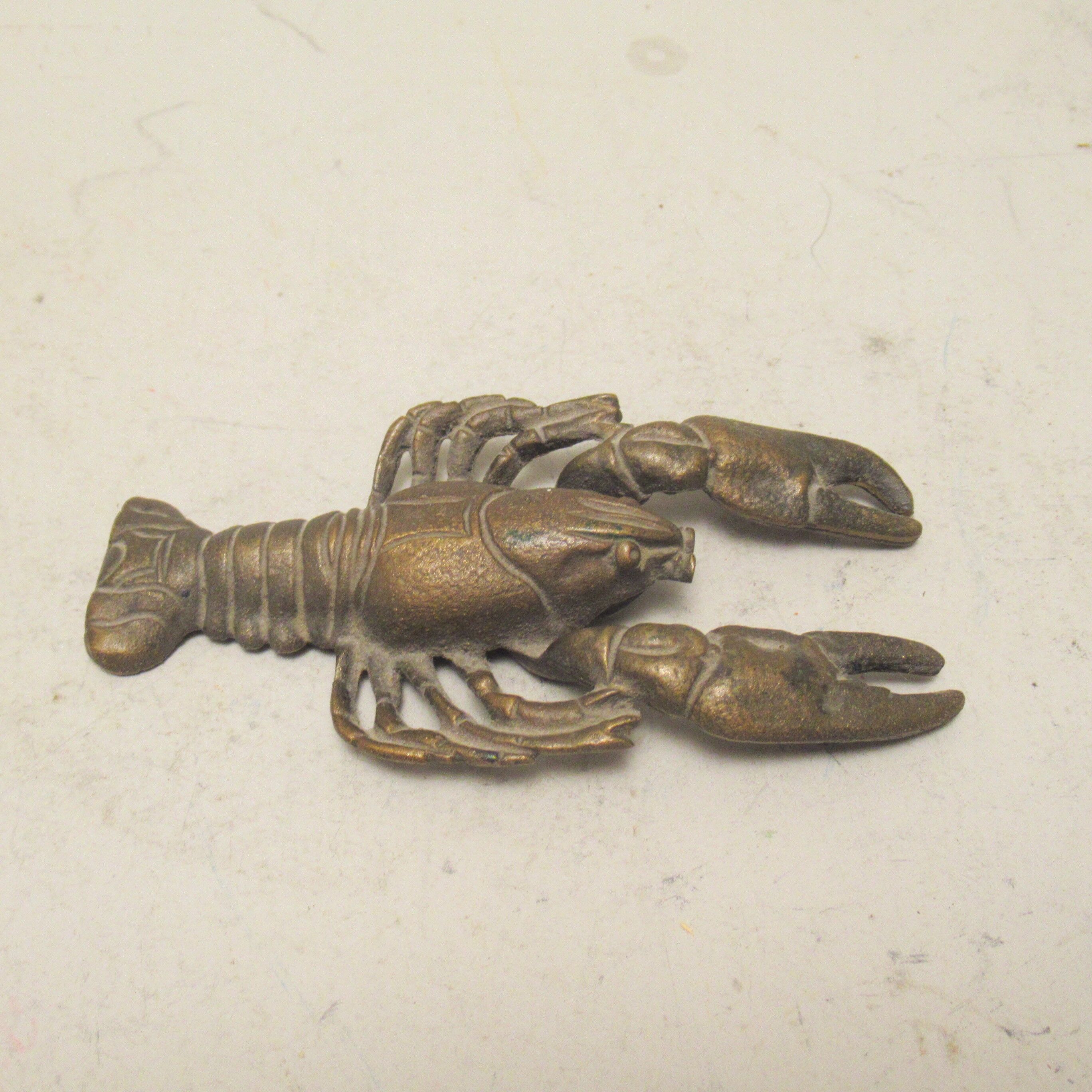 Sculpture screwweight in bronze