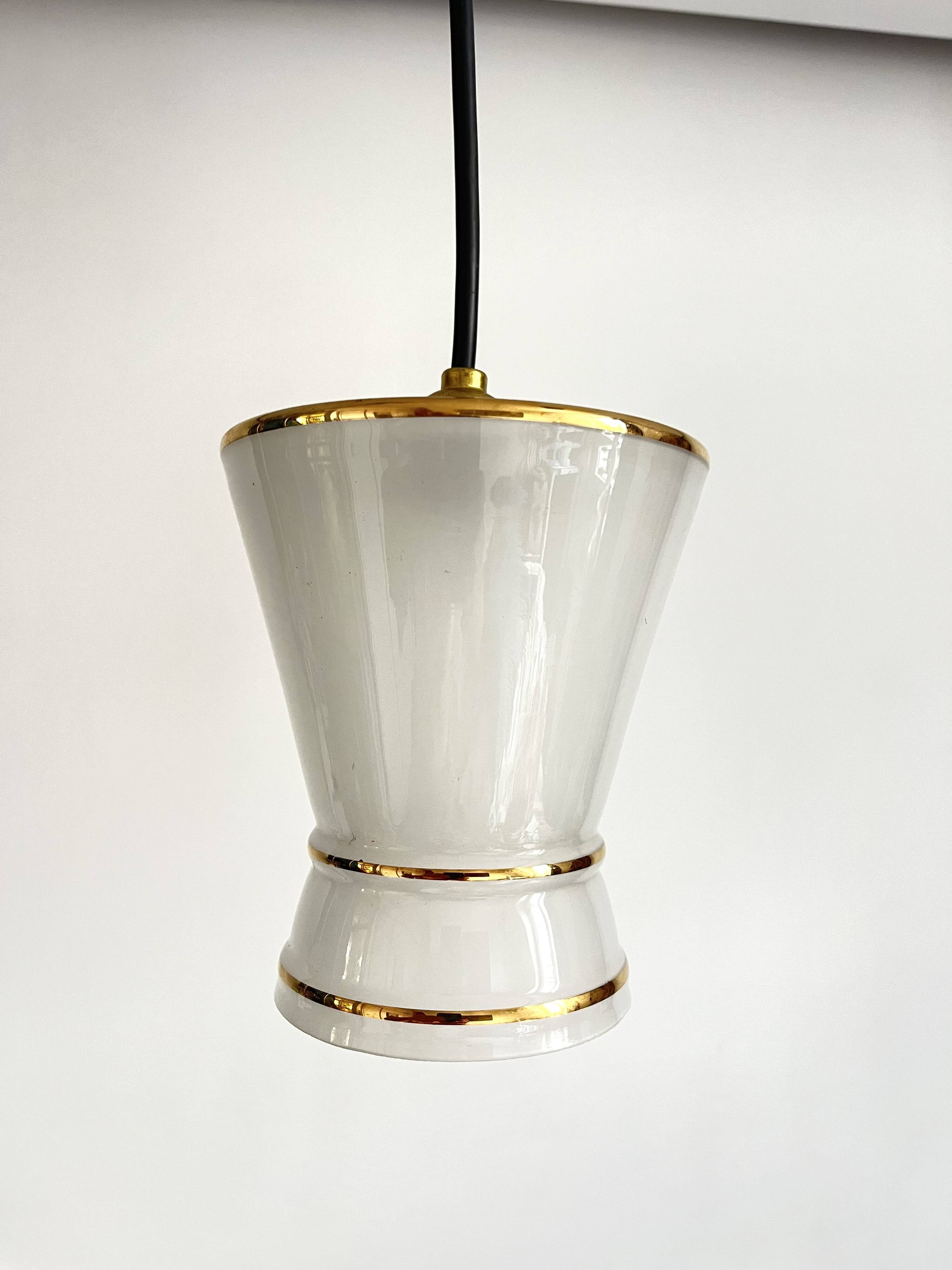 Small white and gold diabolo pendant light