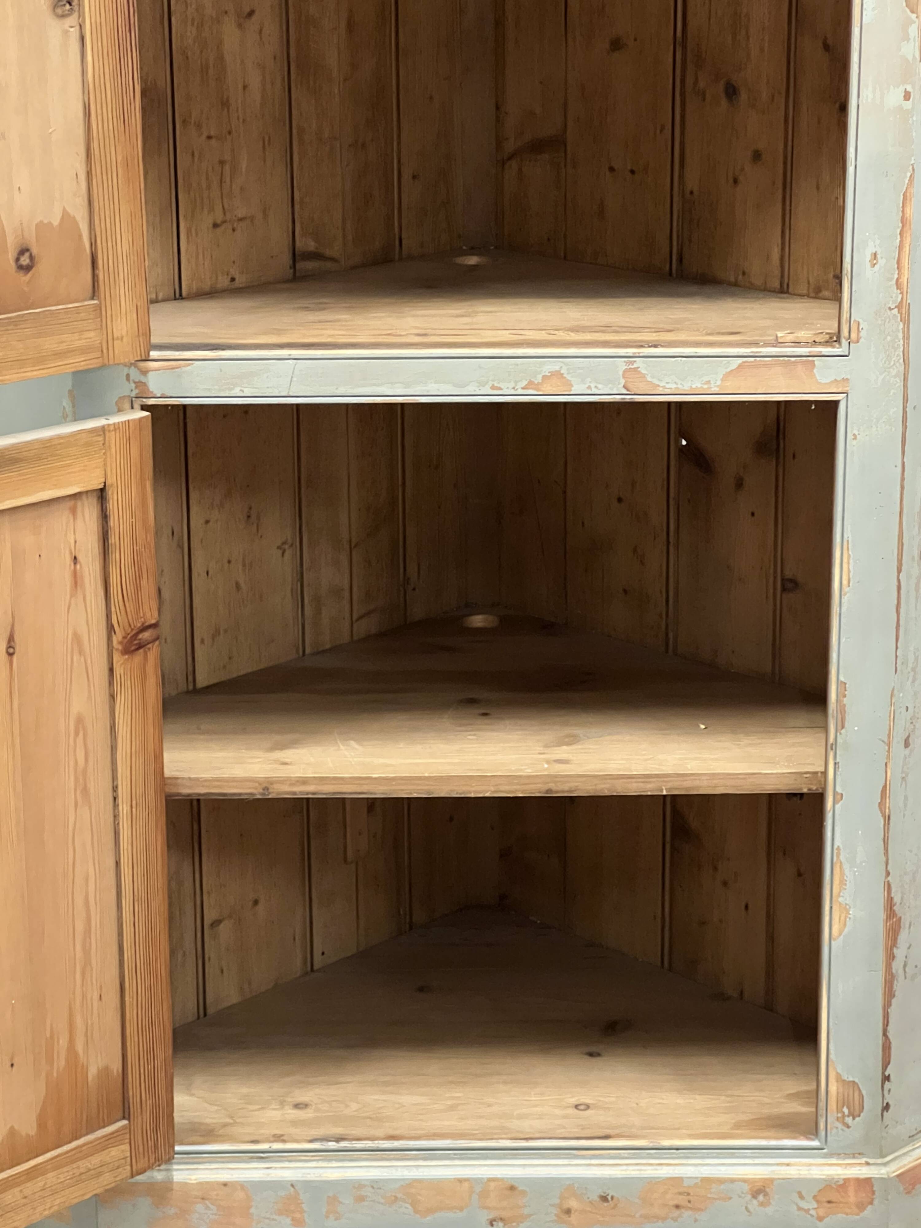 Patinated corner cupboard