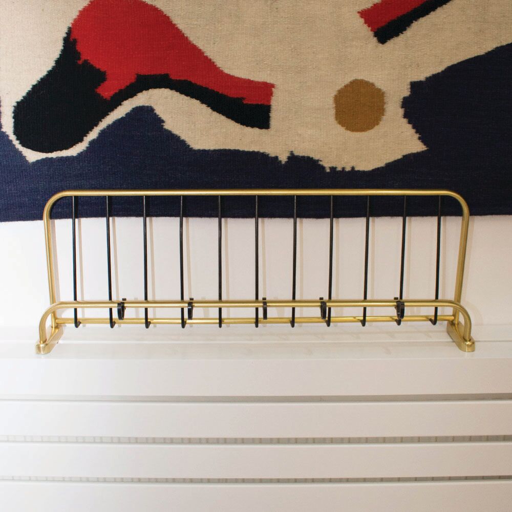 Wall coat rack made of brass