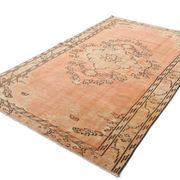 Tapis vintage rose poudré fait main en laine, style oriental doux