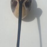 Carved painted wooden curlew