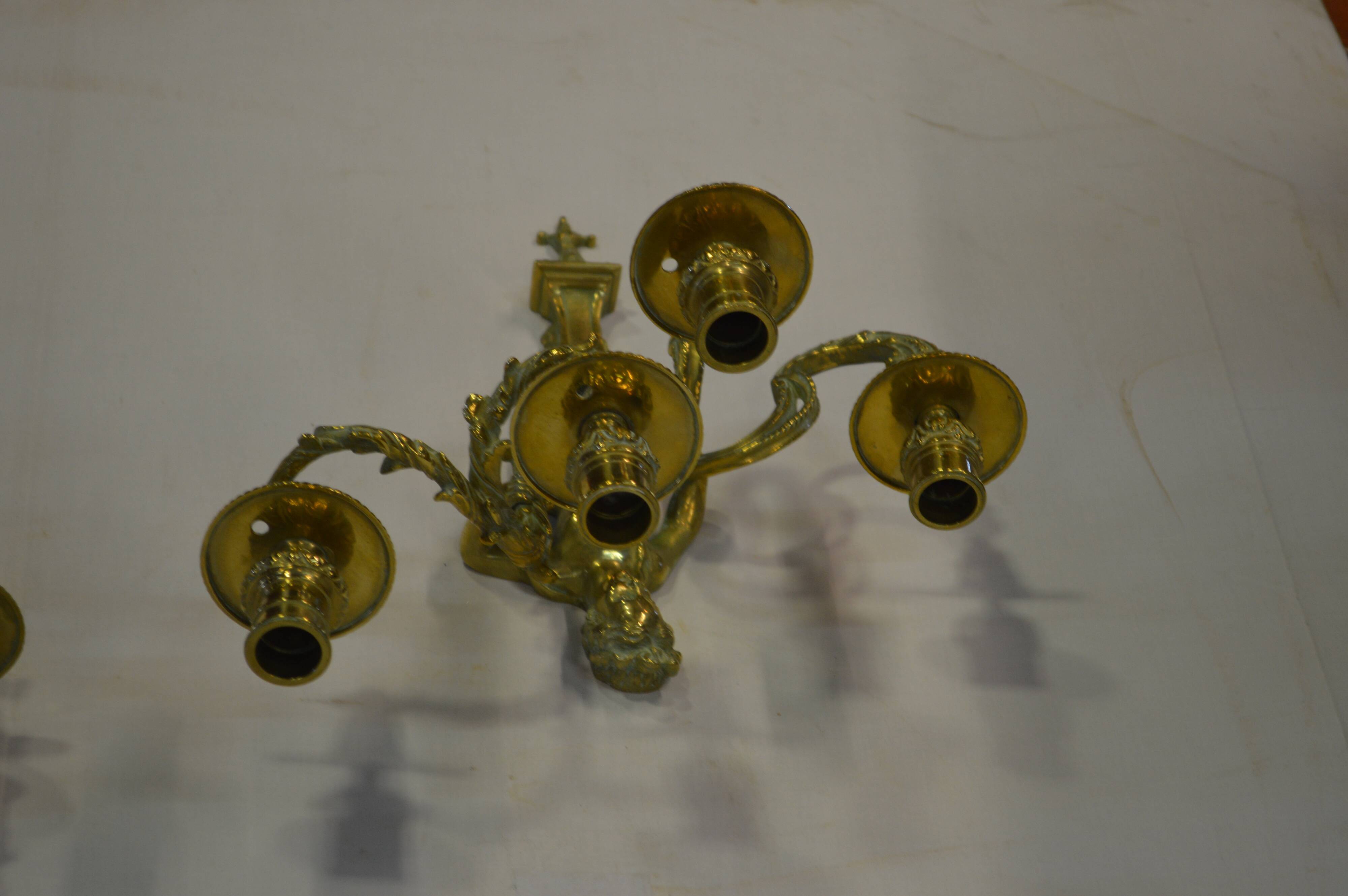 Louis XV style bronze sconces with cariatids