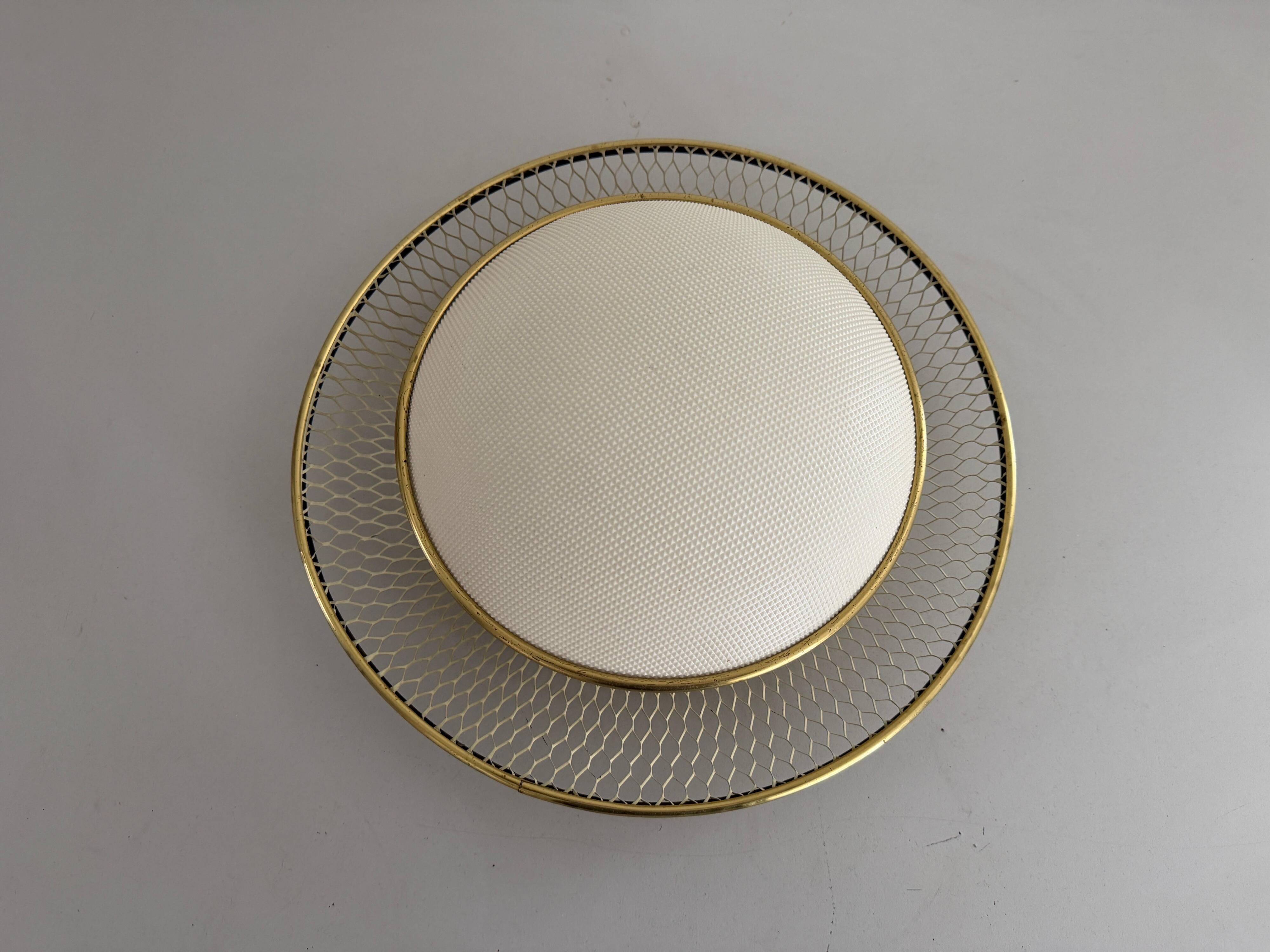 Mid-century golden metal wire and plastic ceiling light by Erco, 1950s, Germany.