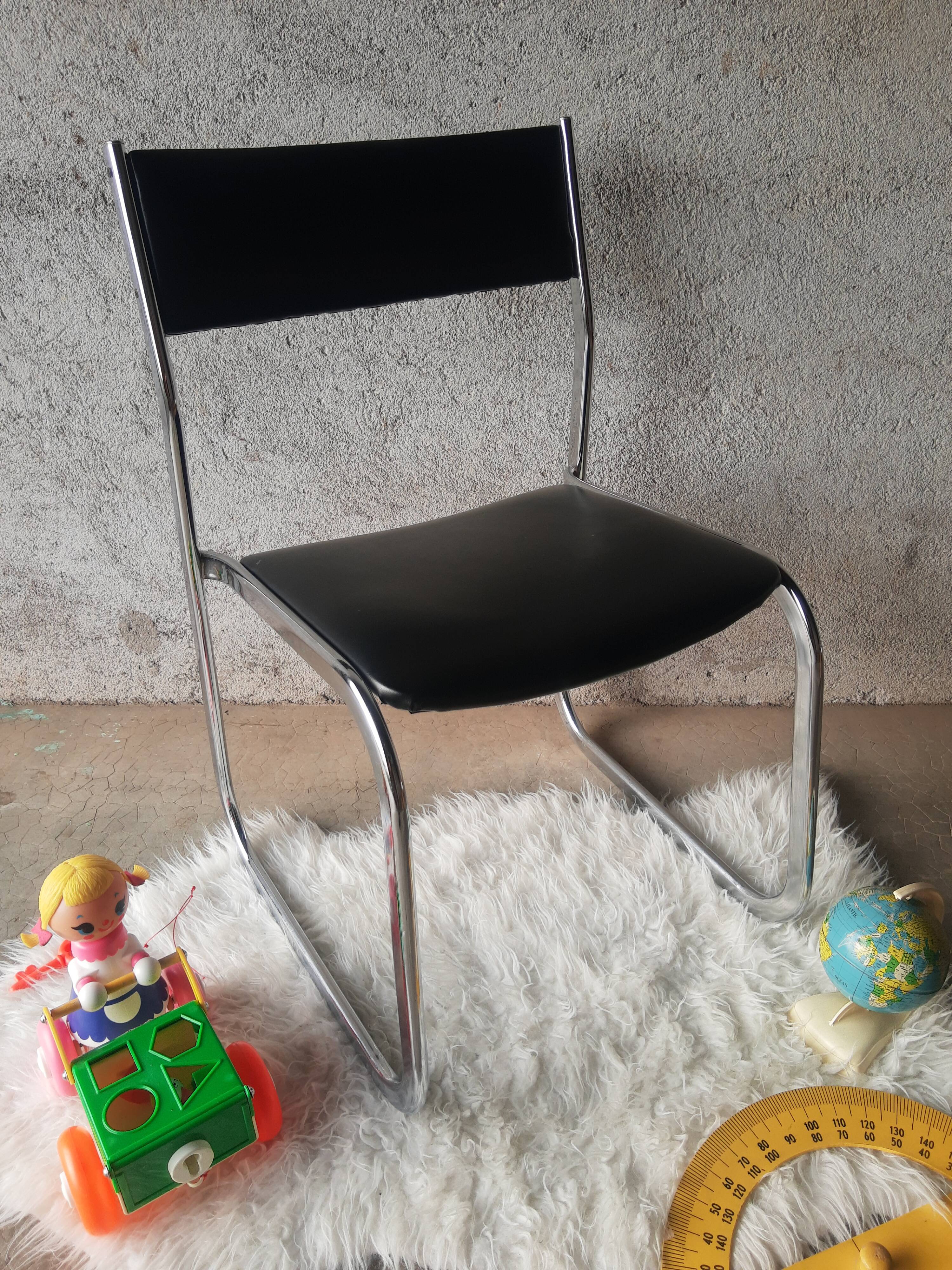 Vintage 70s black skai sled chair