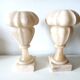 Pair of alabaster fireplace vases on marble base