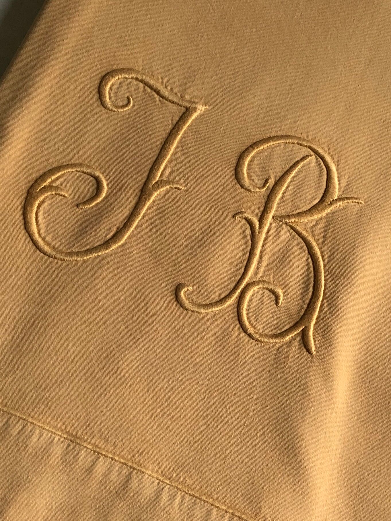 Old linen and yellow cotton sheet
