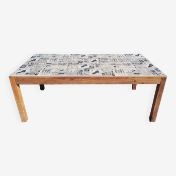 Teak dining table with illustrated top