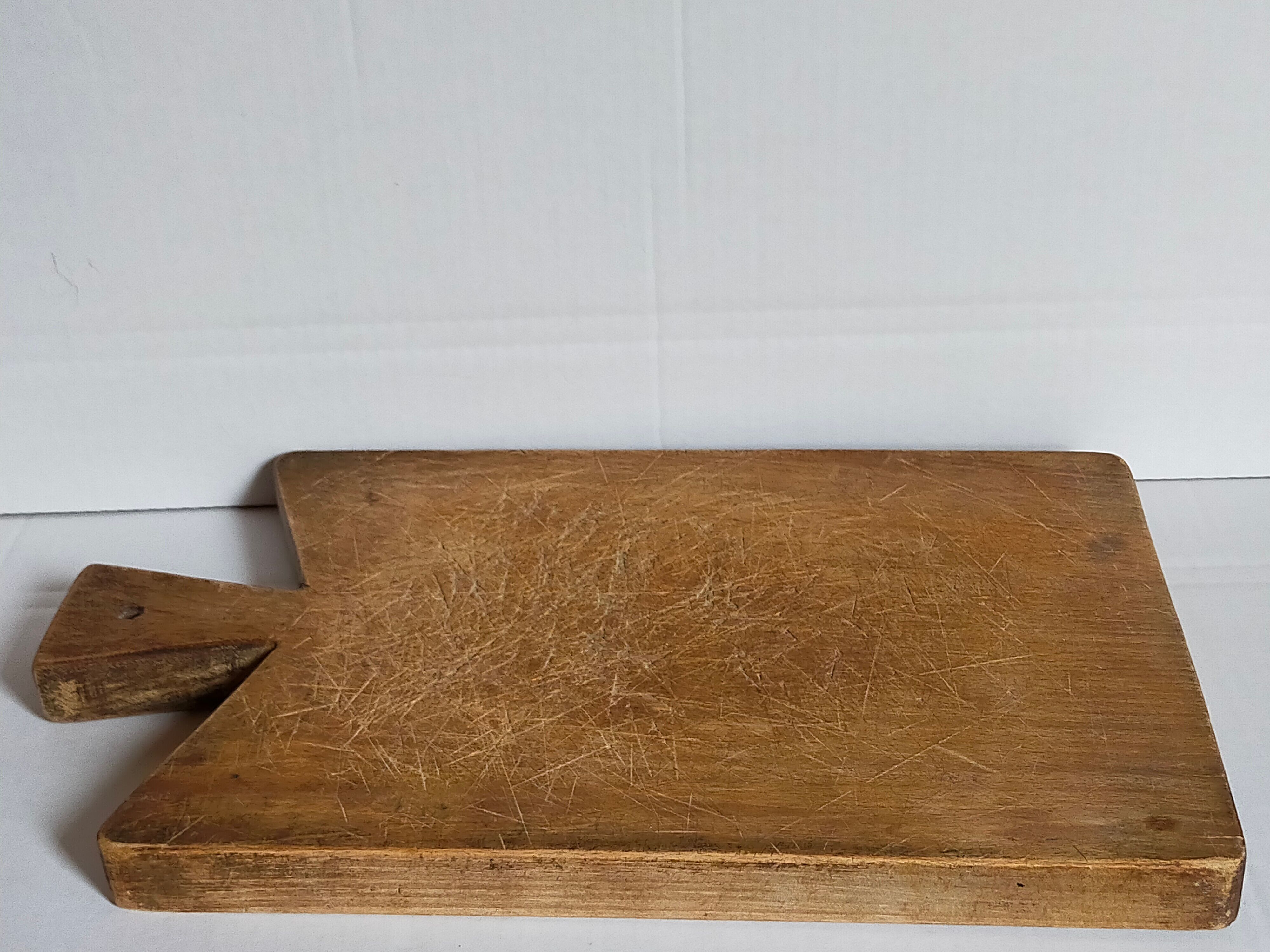 Cutting board in old solid wood