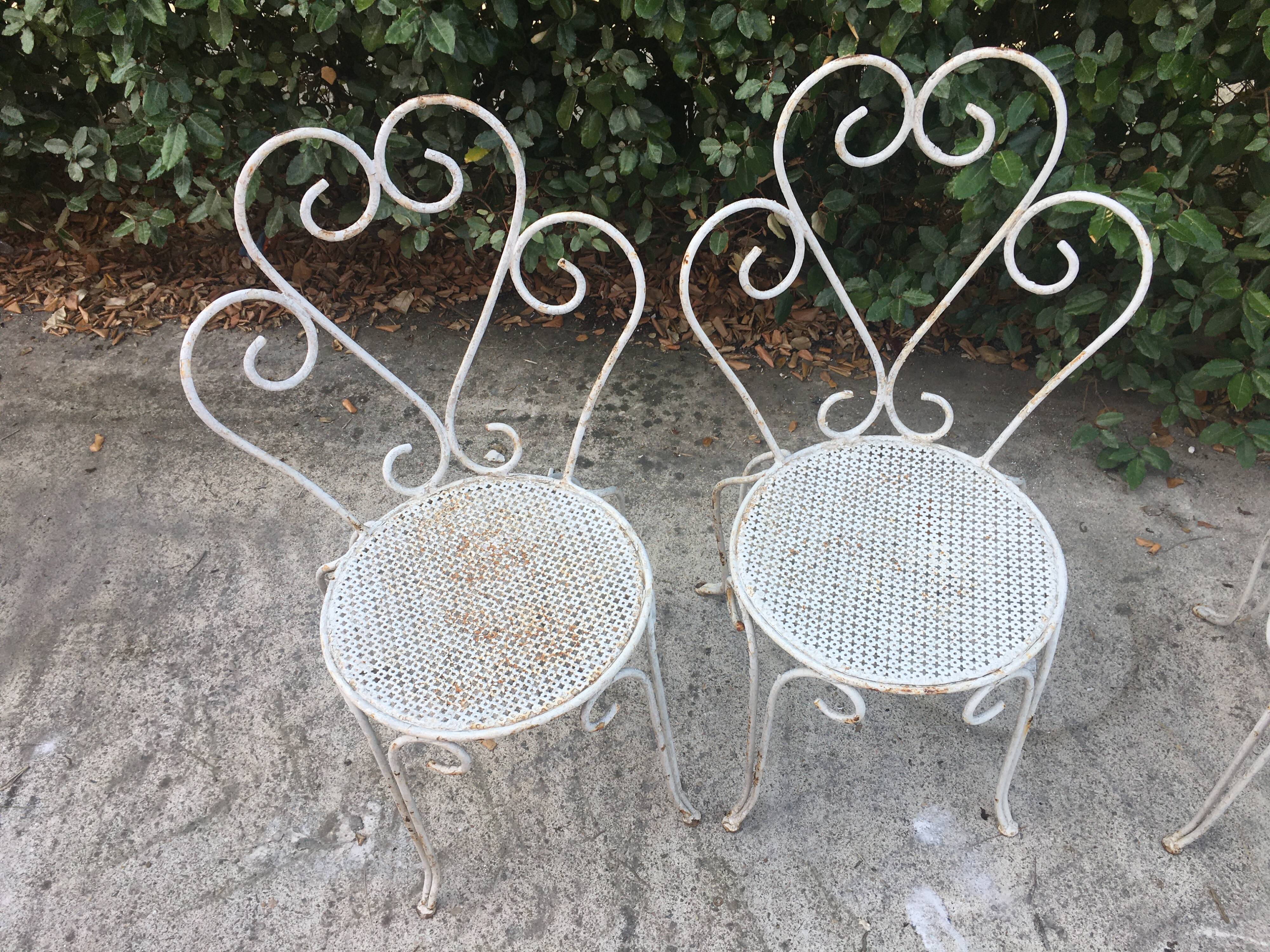 Set of 4 wrought iron chairs