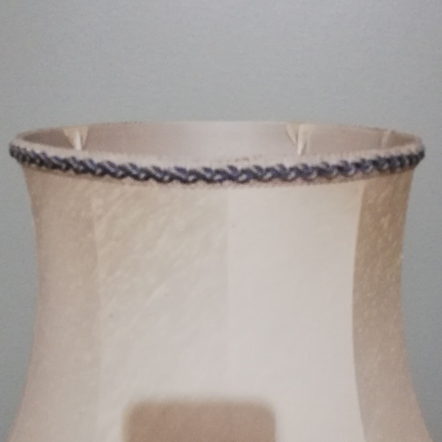 Ceramic lamp with Asian decoration with matching lampshade.