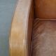 Fauteuil design en cuir de vachette couleur cognac clair