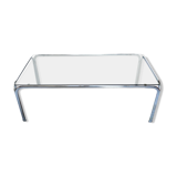 Metal table and smoked glass