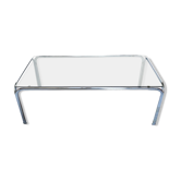 Metal table and smoked glass
