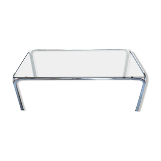 Metal table and smoked glass