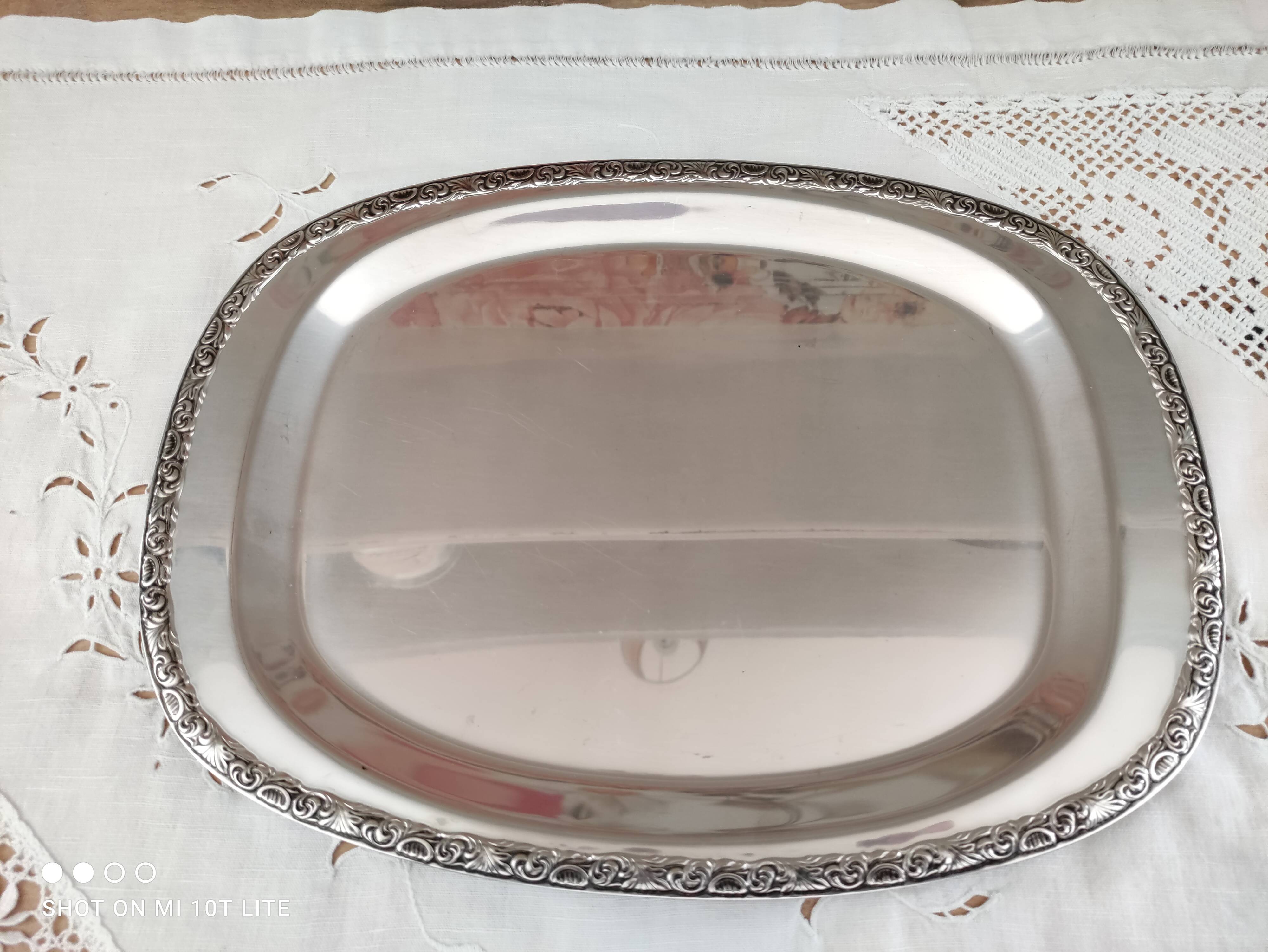 Small rectangular tray in stainless steel frieze of rinses