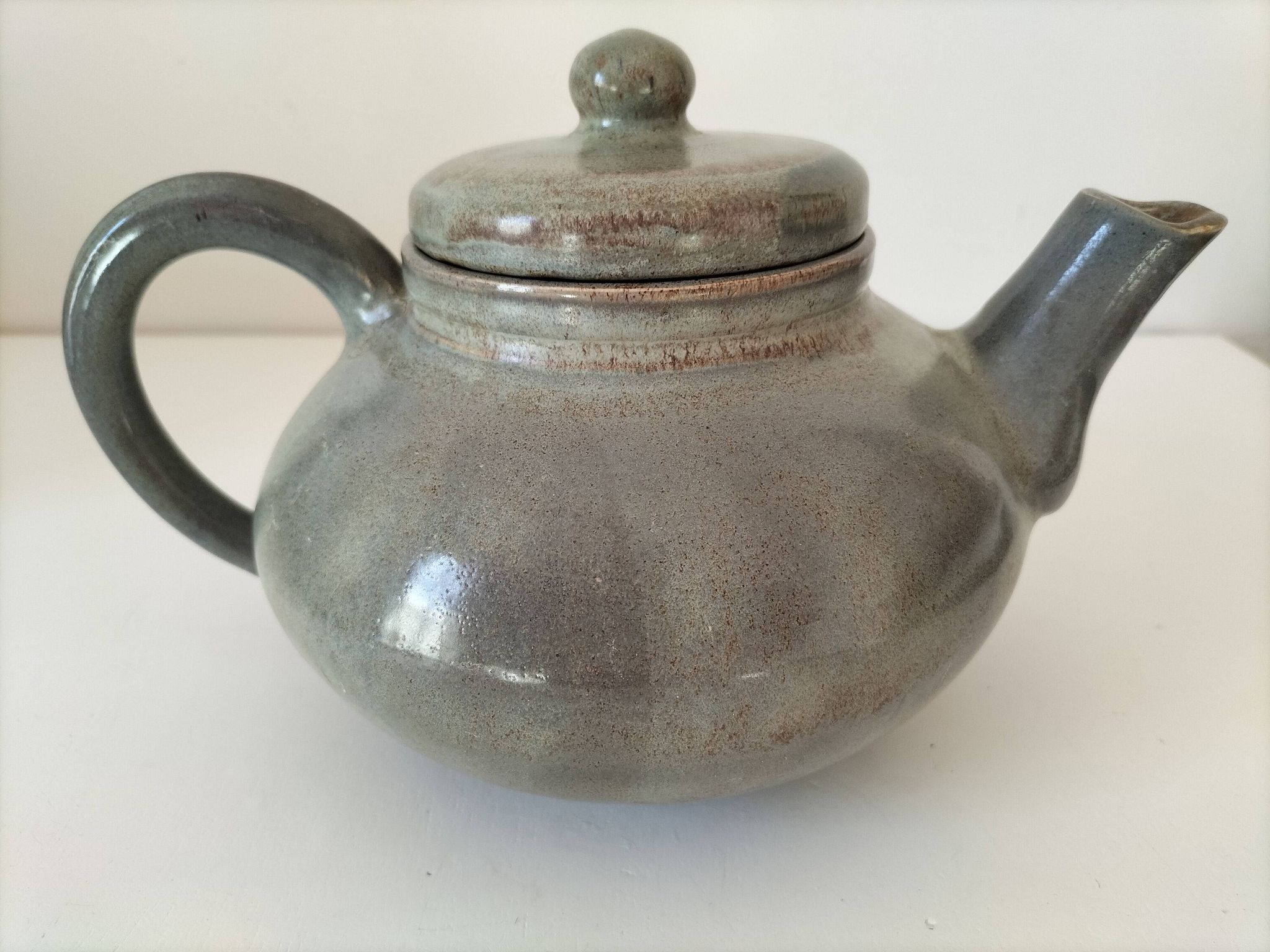 Large handcrafted celadon glazed ceramic teapot