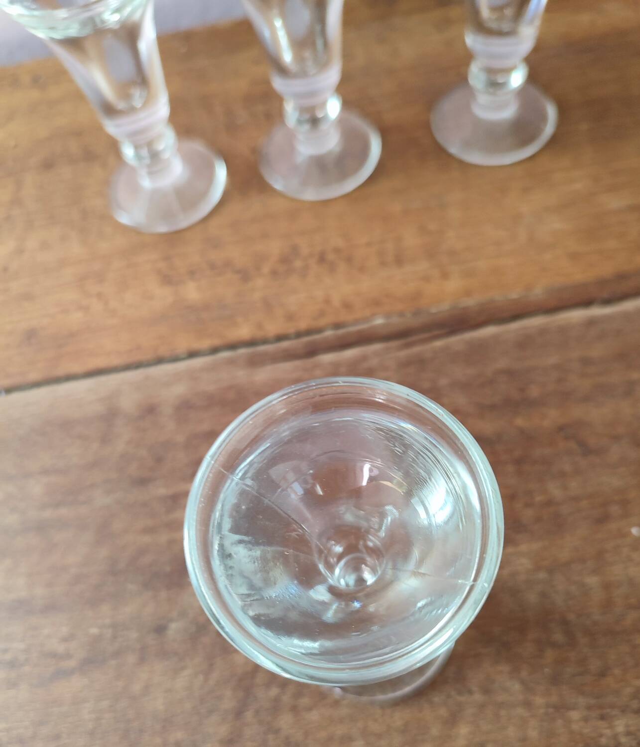 Set of 6 antique glasses known as "false bottom" glasses.