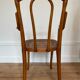 Old thonet armchair in curved wood and rattan cane