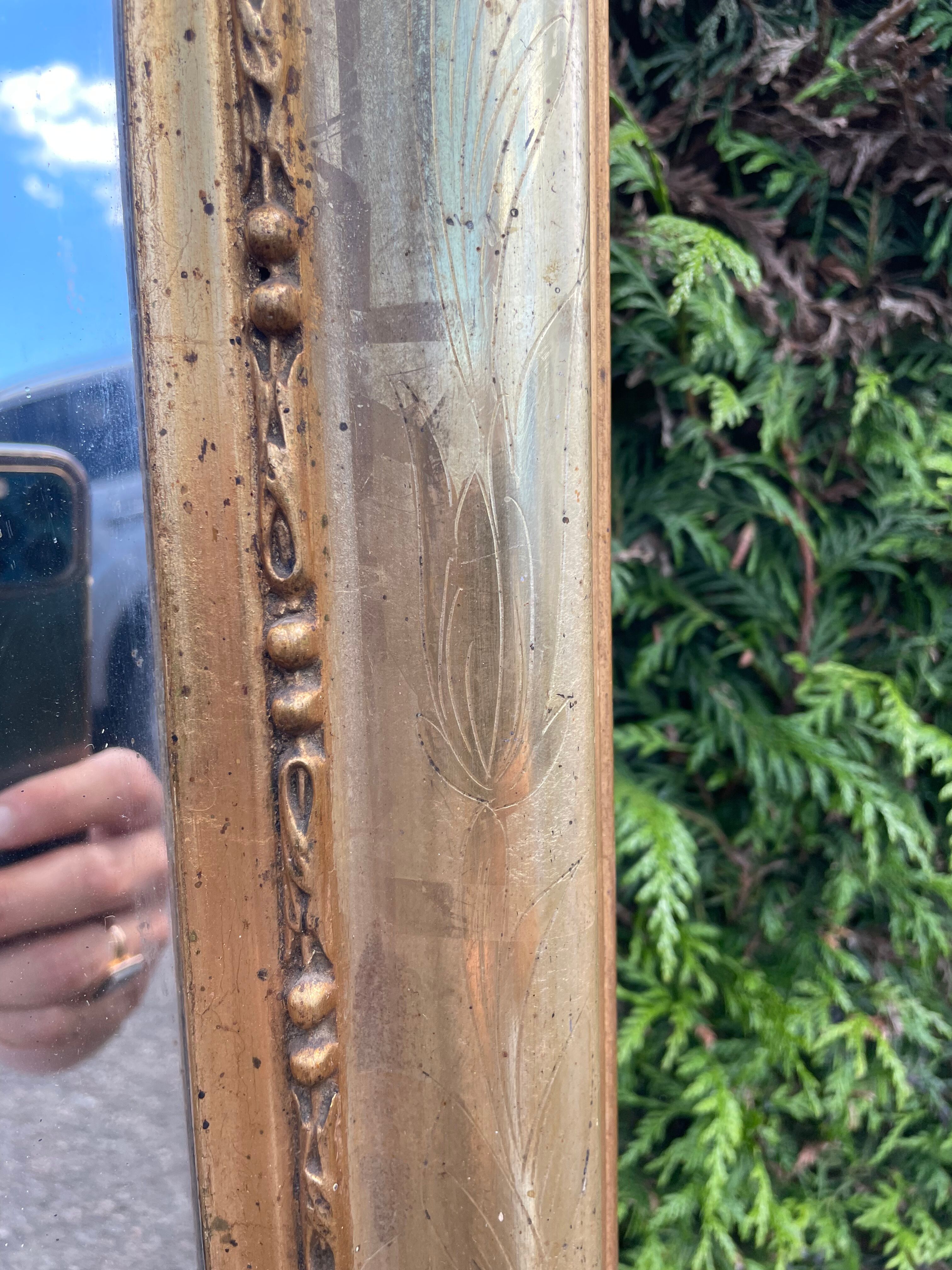 Louis Philippe period mirror with 19th gold leaf