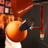 Vintage 4-spot pendant light / adjustable chandelier, chrome-plated & orange lacquered steel, Space Age design, 70s