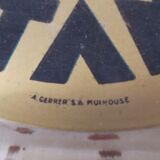 Picks up vintage advertising money Gitanes