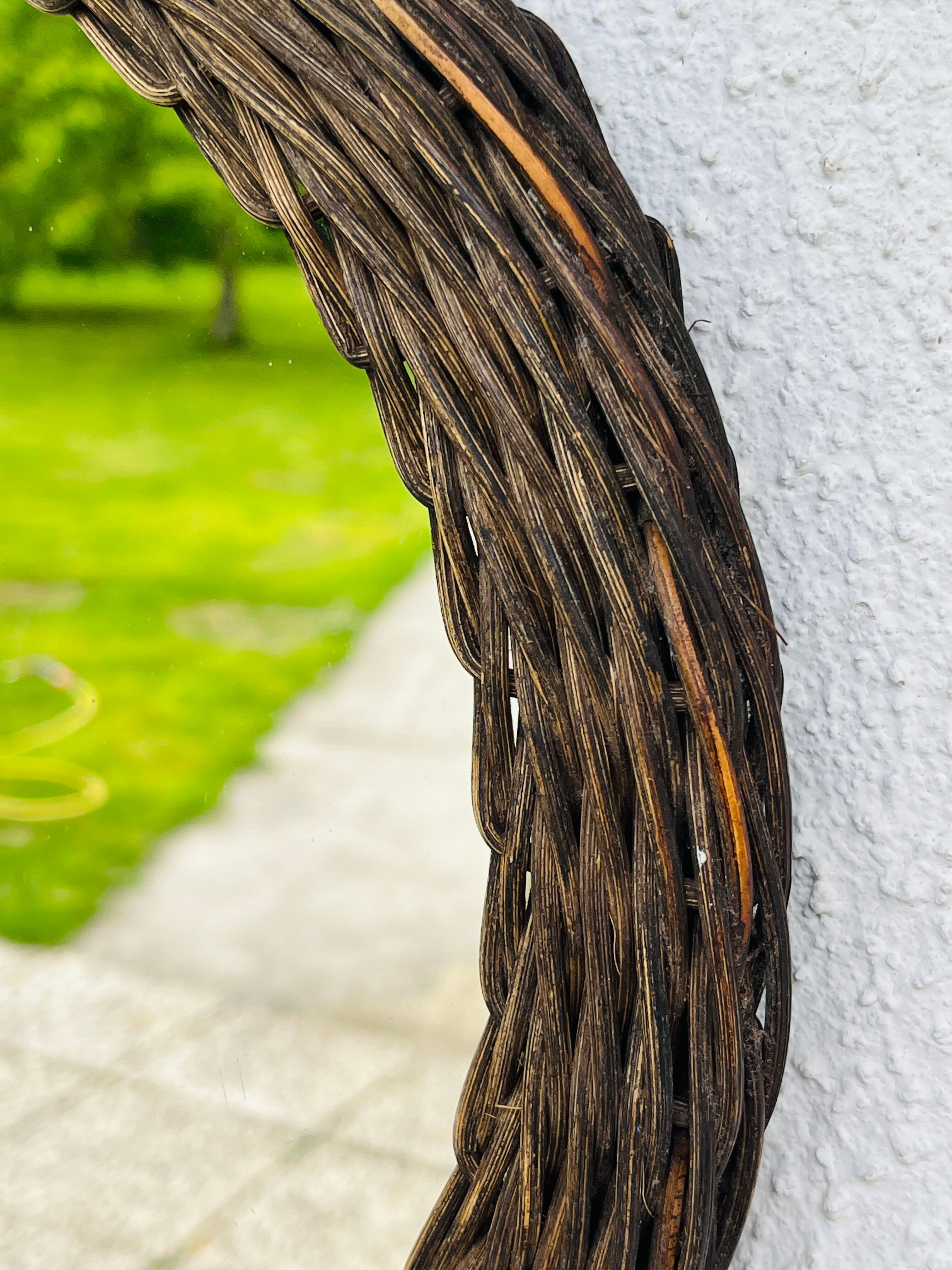 Vintage sun mirror in woven wicker