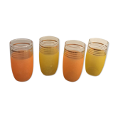 Four glasses in orange granités in orange and yellow