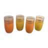 Four glasses in orange granités in orange and yellow