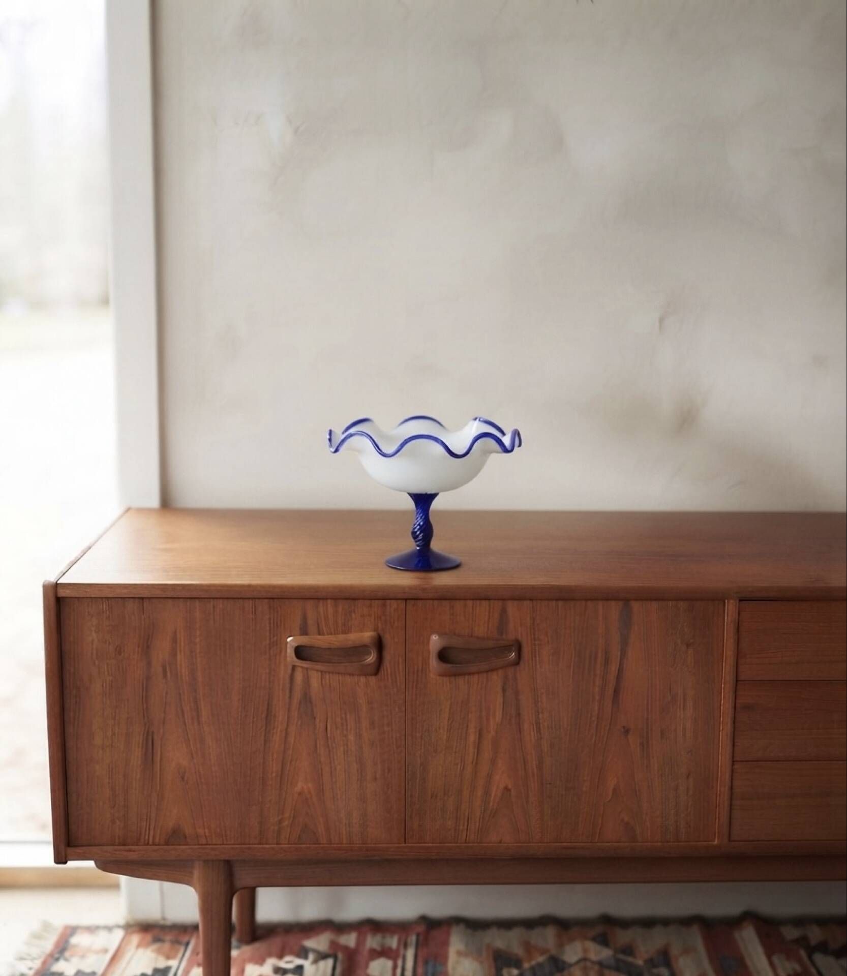 Vintage footed coupe in opaline white and cobalt blue blown glass –