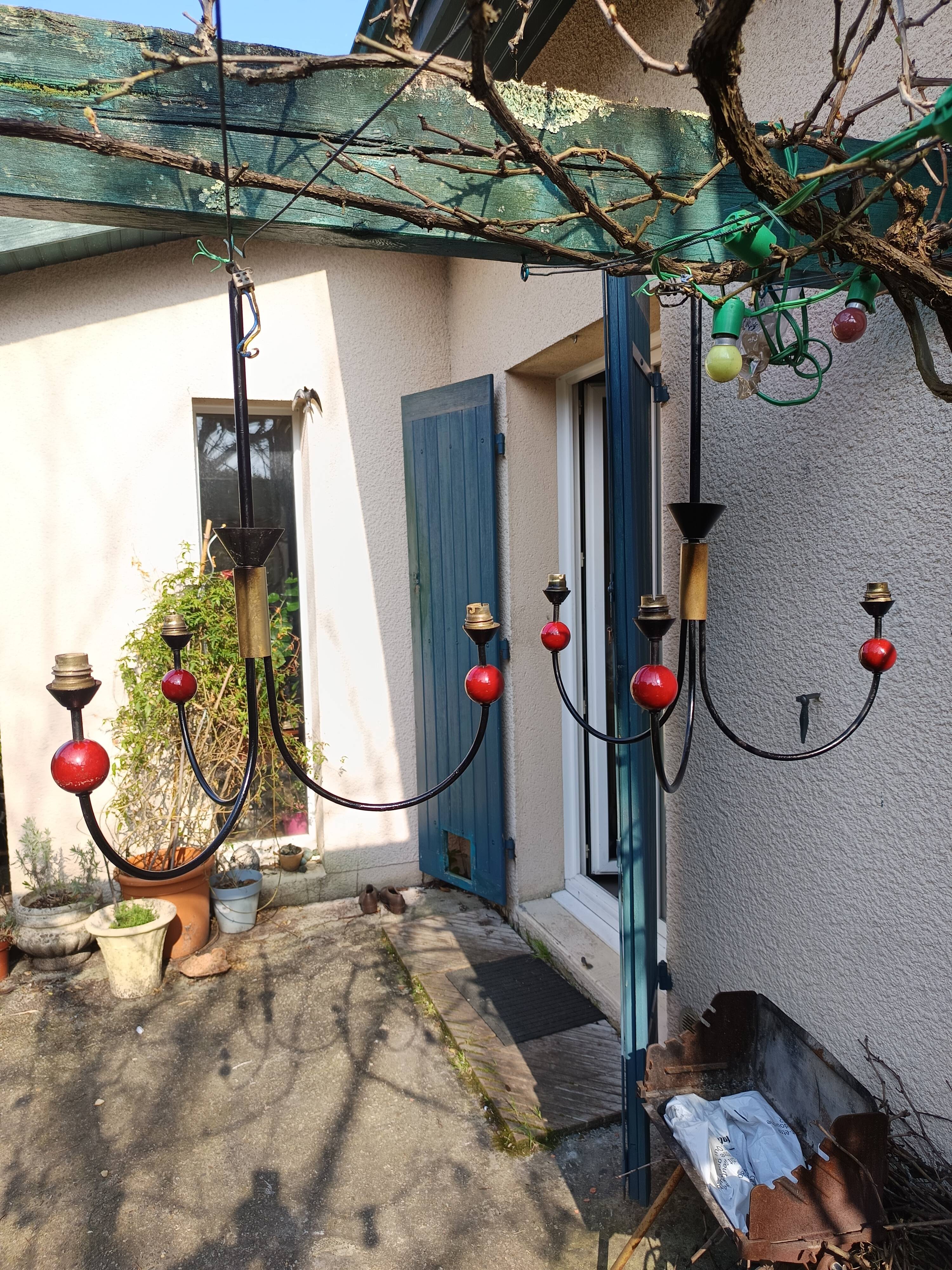 pair of vintage black metal chandeliers with red balls 1950/1970