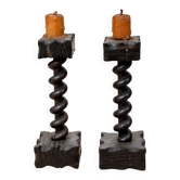 Charming pair of antique turned wooden candlesticks, featuring a beautiful p