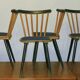 Ensemble de 4 chaises de salle à manger avec des pieds évasés et des housses de siège bleu marine, années 1960.