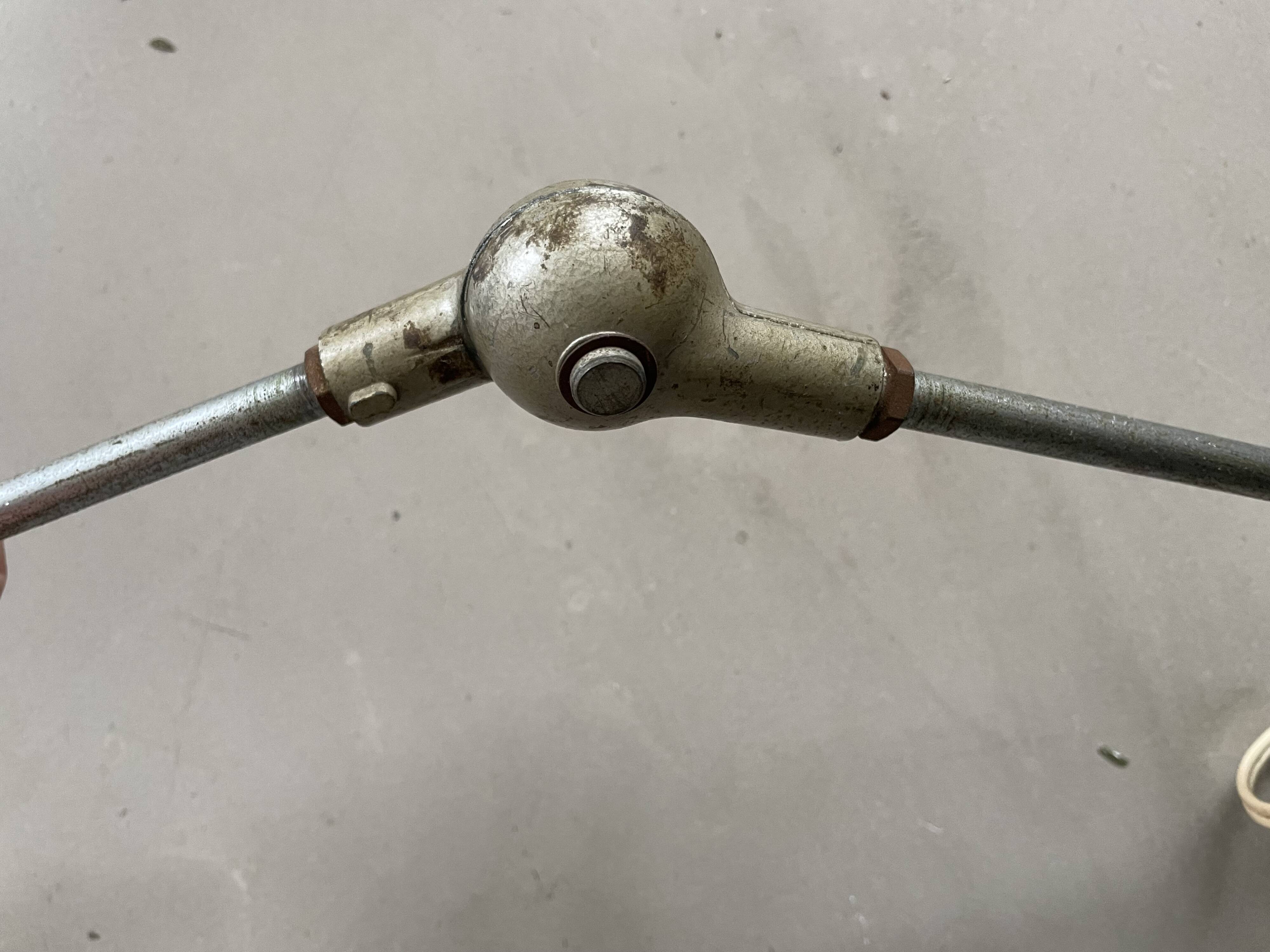 Old industrial articulated lamp